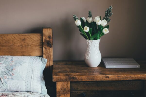 white flower vase on surface